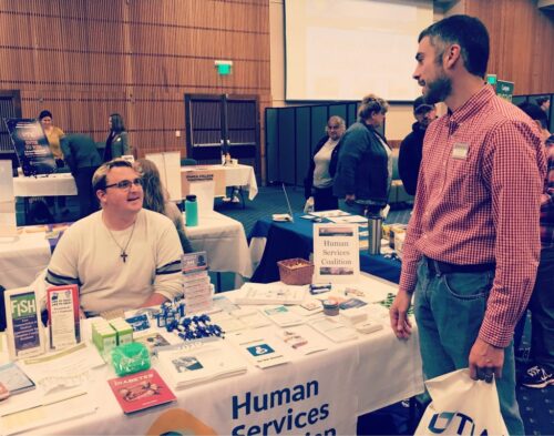 JD Drader tabling at the Ithaca College Employee Benefits Fair